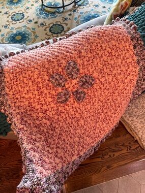 Handcrafted Pink Crochet Quilt with Floral Accent